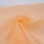 Tissu ripstop en polyamide 6.6 HT orange pastel traité anti-déchirure