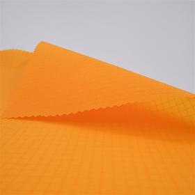 Tissu ripstop en polyamide 6.6 orange enduction en polyuréthane