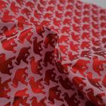 Tissu satin de coton imprimé à motifs d'éléphants rouges métallisés sur fond